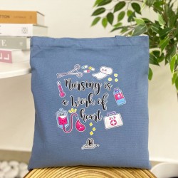 TOTE BAG NURSING IS A WORK OF HEART - LIGHT BLUE