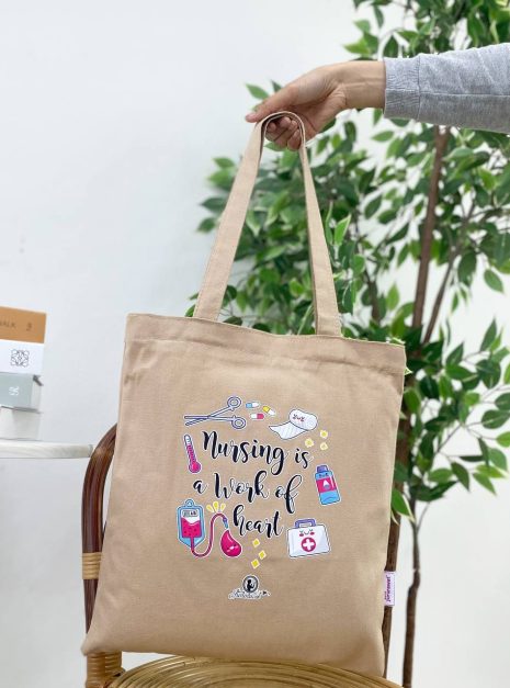 TOTE BAG NURSING IS A WORK OF HEART - NUDE