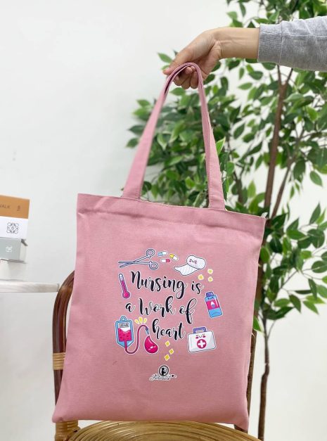 TOTE BAG NURSING IS A WORK OF HEART - PINK